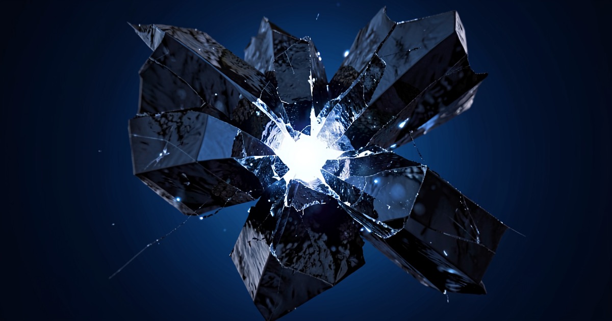 Abstract composition of a dark crystalline structure fracturing to reveal inner light against a deep blue gradient background
