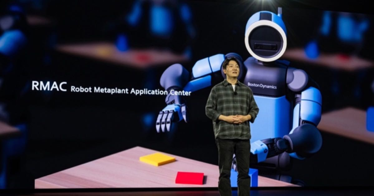 Boston Dynamics Atlas humanoid robot on display at CES 2026, with Hyundai Motor Group branding visible on the stage backdrop.